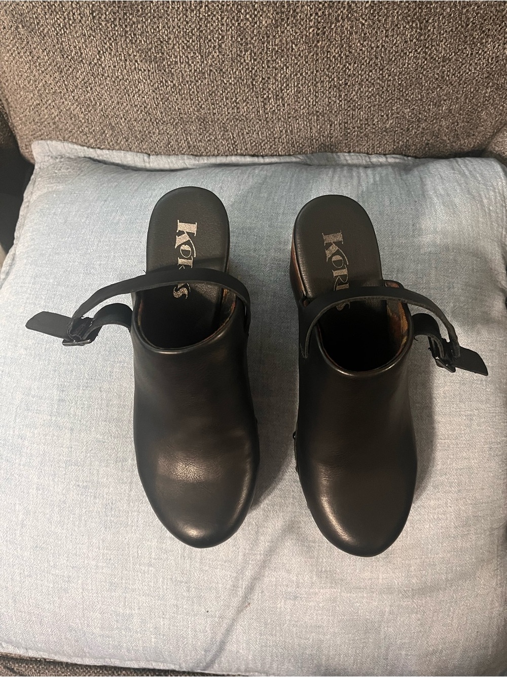 Korks Black Leather Clog Mules with Adjustable Sling Strap